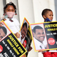 Family members of Ronald Greene listen to speakers during the “Commitment March: Get Your Knee Off Our Necks” protest against racism and police brutality, at the Lincoln Memorial on August 28, 2020, in Washington DC. Greene died in police custody following a high-speed chase in Louisiana in 2019.